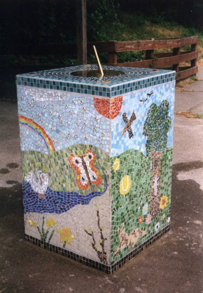 sundial on mosaic plinth